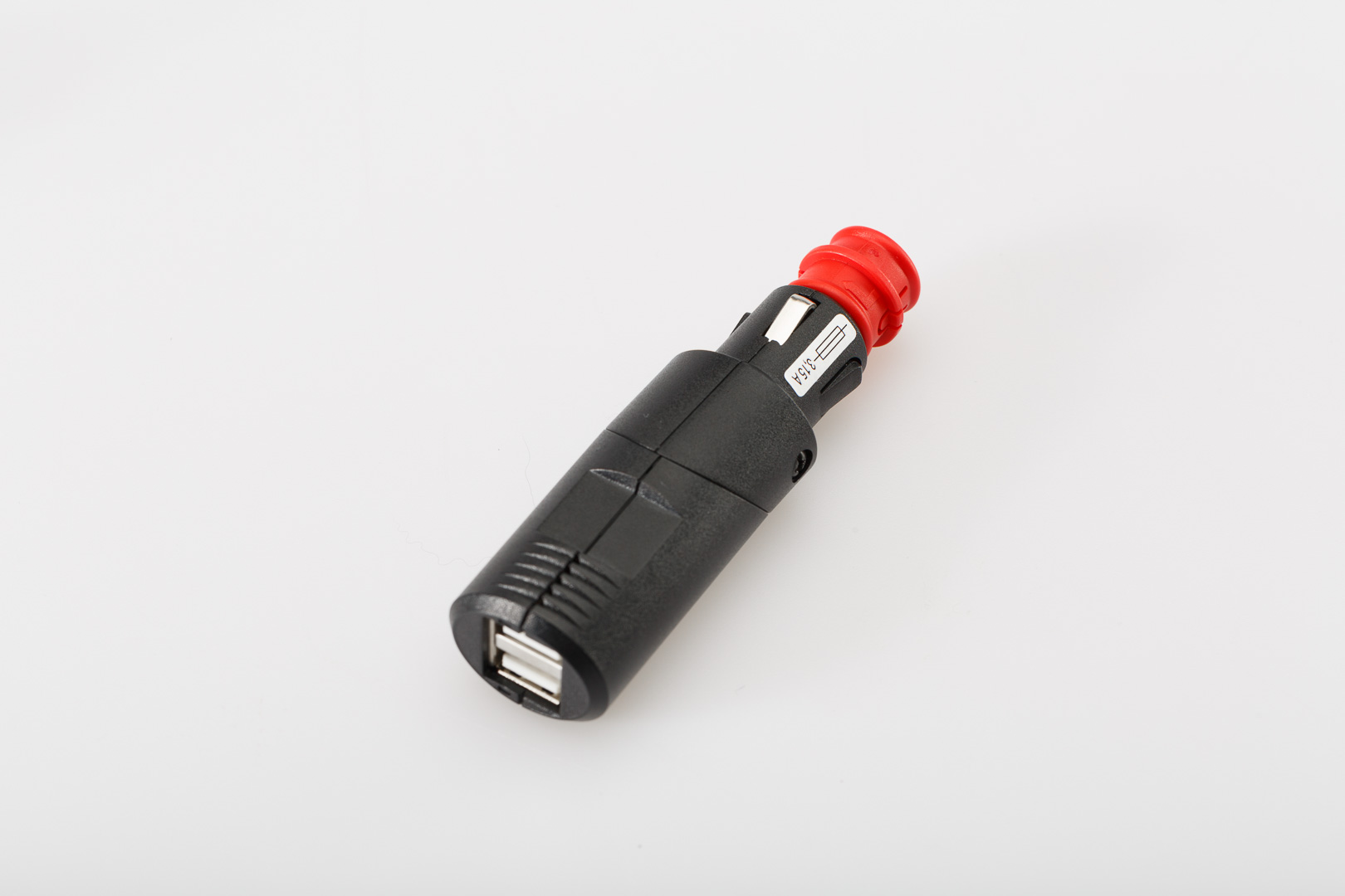 Side view of SW-Motech Double USB power port with universal plug - For 12V DIN / cigarette lighter socket. 2x2100 mA.