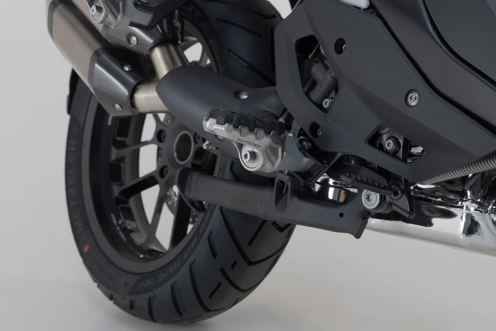 Side view of SW-Motech EVO footrest kit - BMW R 1200 GS, R 1250 GS, R 1300 GS., black-silver