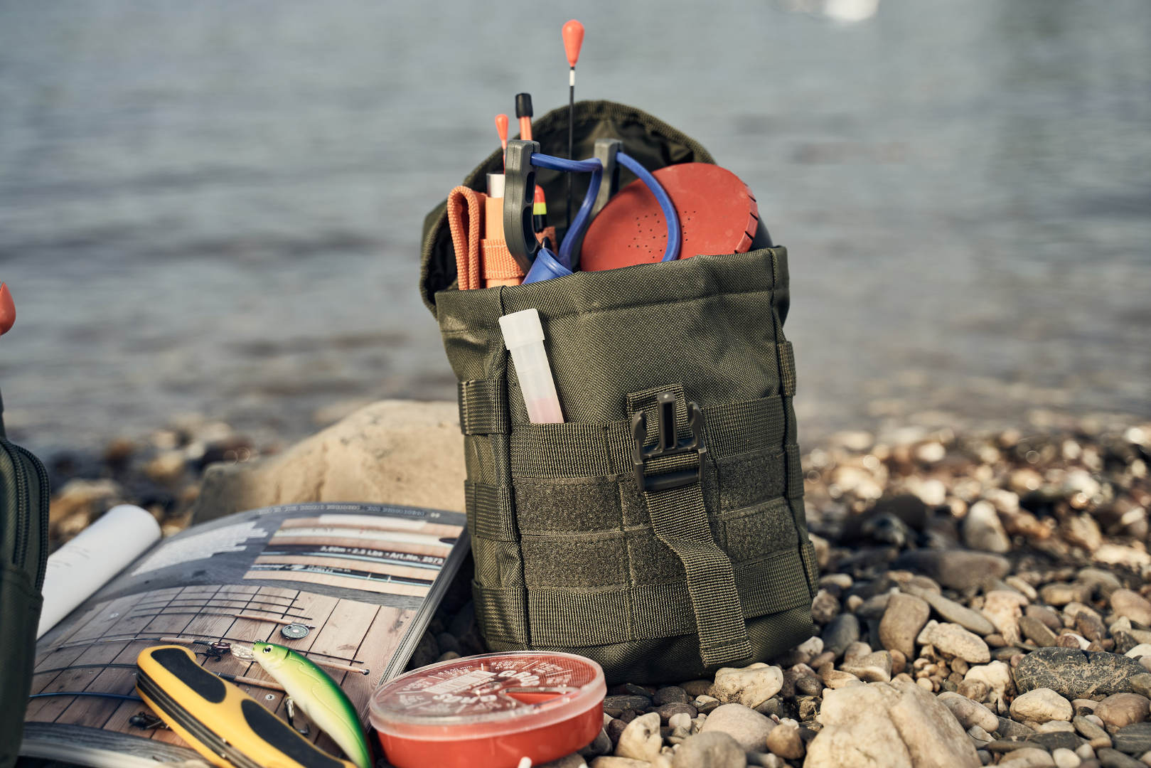 Side view of Brandit Molle Pouch Fire Bag, green for Men