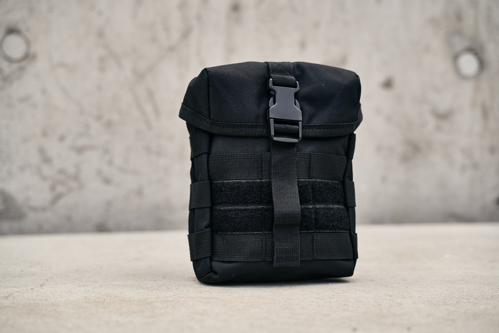 Side view of Brandit Molle Pouch Fire Bag, black for Men