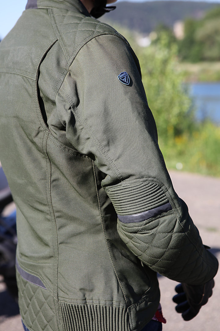 Side view of Modeka Thiago Ladies Motorcycle Textile Jacket, green, Size 46 for Women