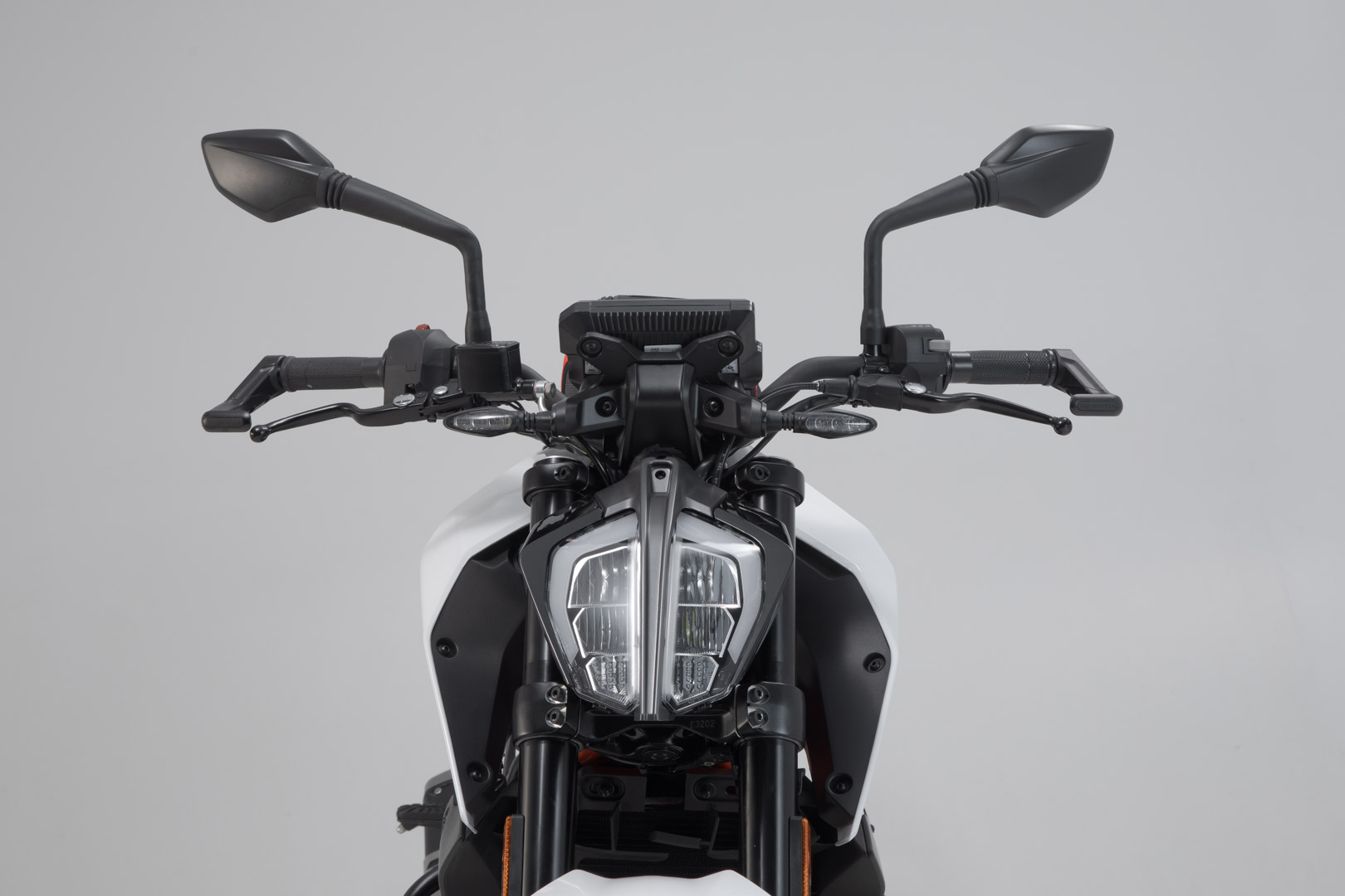 Side view of SW-Motech Lever guards - Black. Ducati / KTM / Aprilia / Honda / Yamaha.