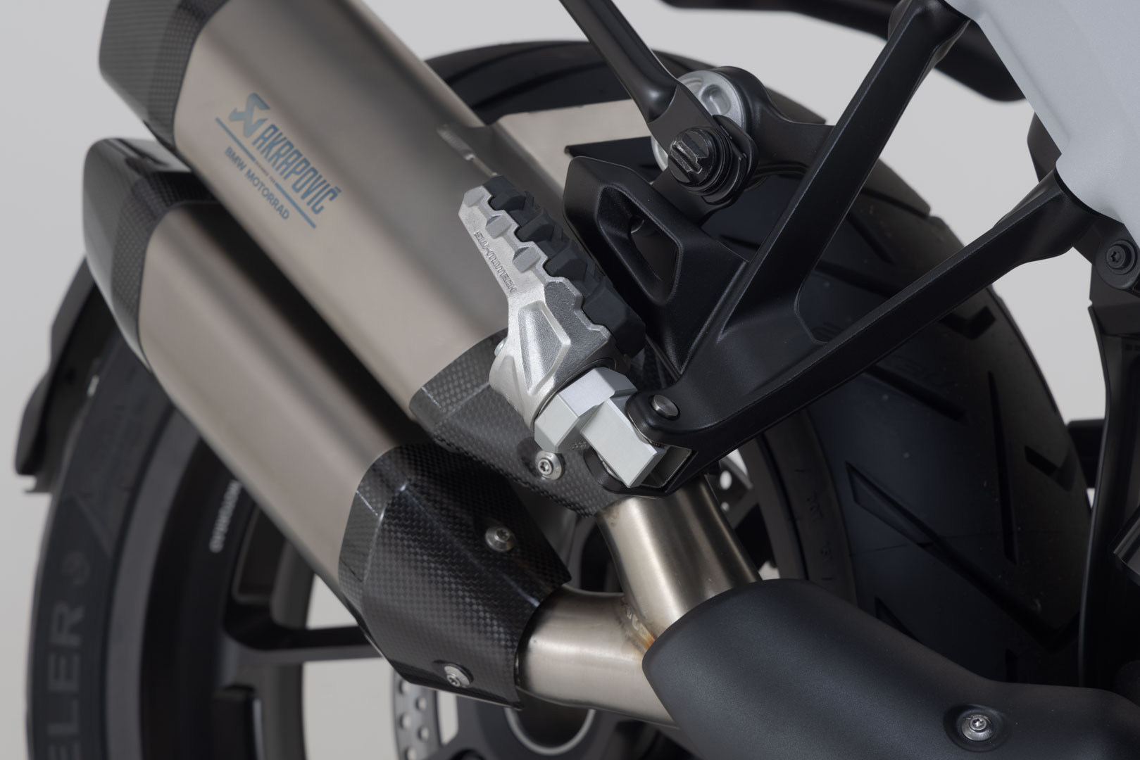 Side view of SW-Motech EVO passenger footrest kit - Harley-Davidson Pan America (21-), BMW R 1300 GS.
