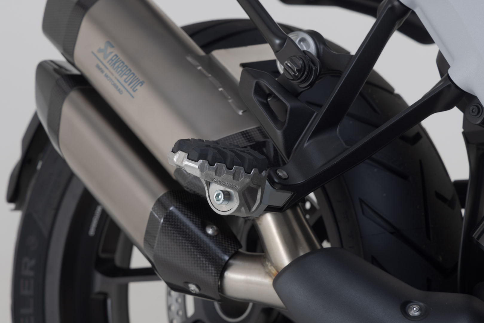 Side view of SW-Motech EVO passenger footrest kit - Harley-Davidson Pan America (21-), BMW R 1300 GS.