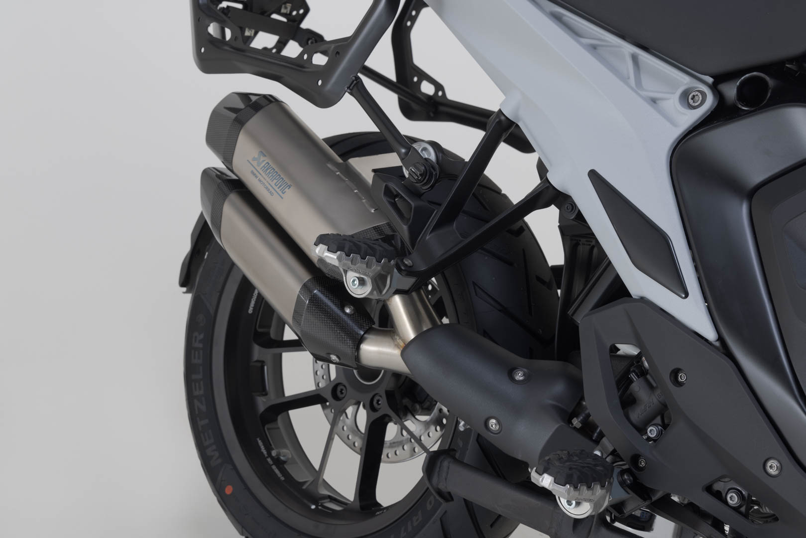Side view of SW-Motech EVO passenger footrest kit - Harley-Davidson Pan America (21-), BMW R 1300 GS.