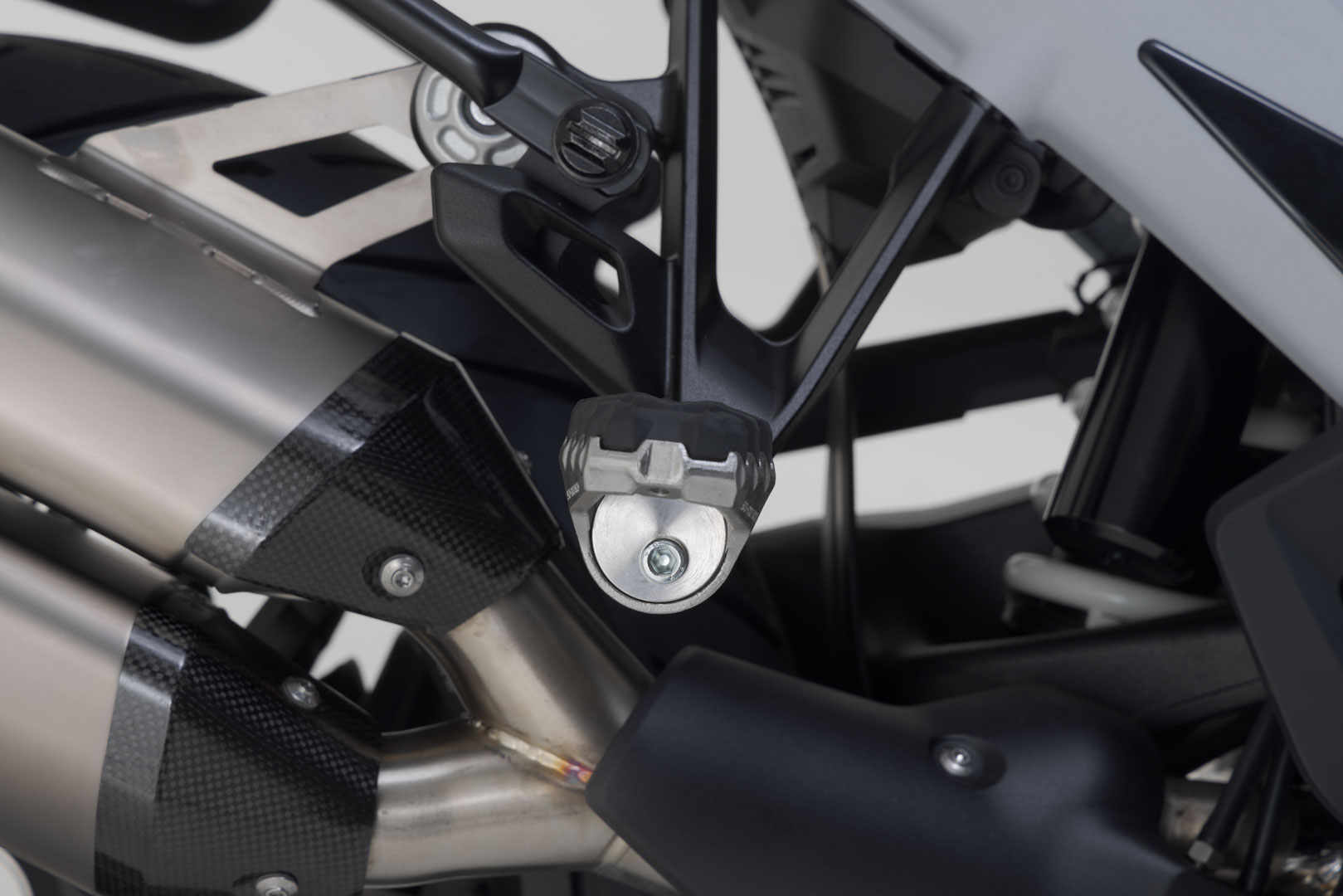 Side view of SW-Motech EVO passenger footrest kit - Harley-Davidson Pan America (21-), BMW R 1300 GS.