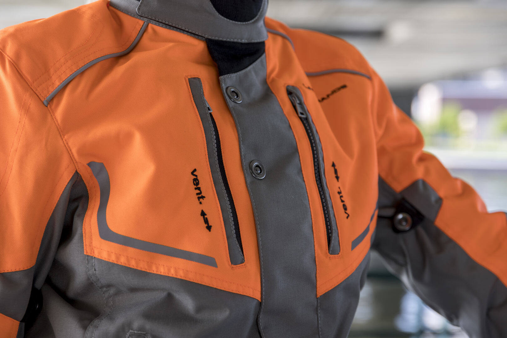 Side view of Lindstrands Halden waterproof Ladies Motorcycle Textile Jacket, grey-orange, Size 46 for Women