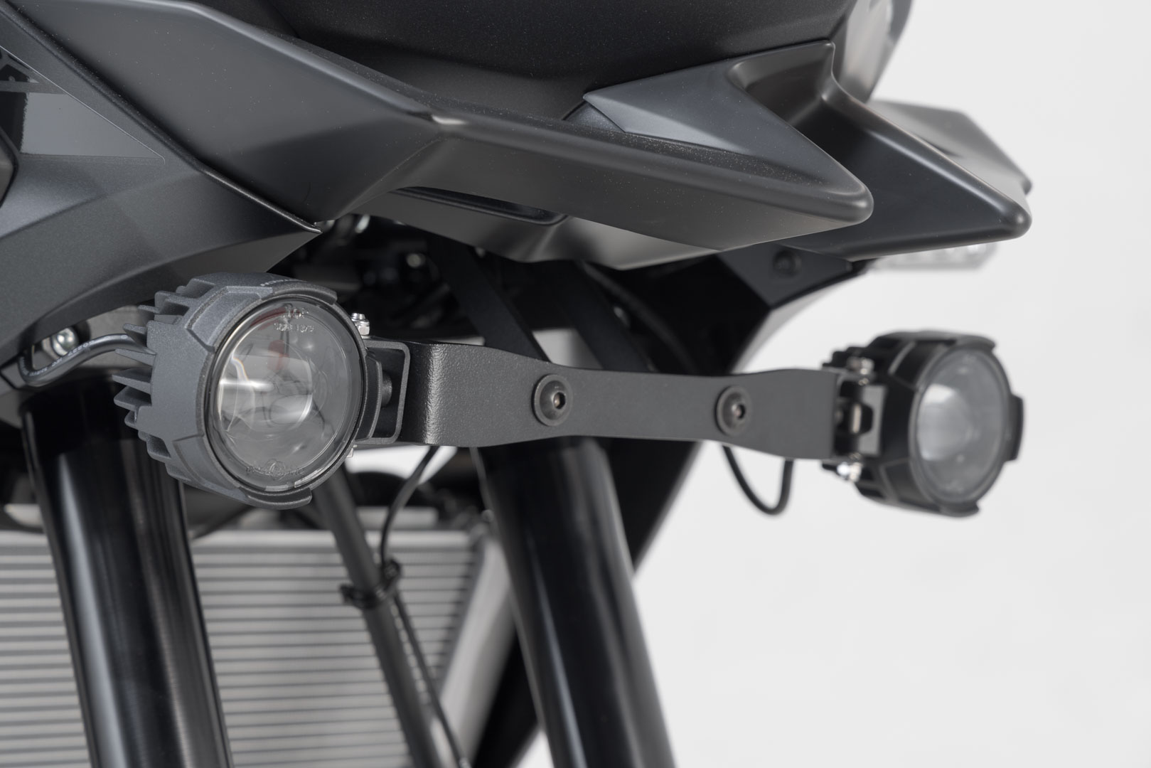 Side view of SW-Motech EVO fog light kit - Black. Kawasaki Versys 650 (21-).