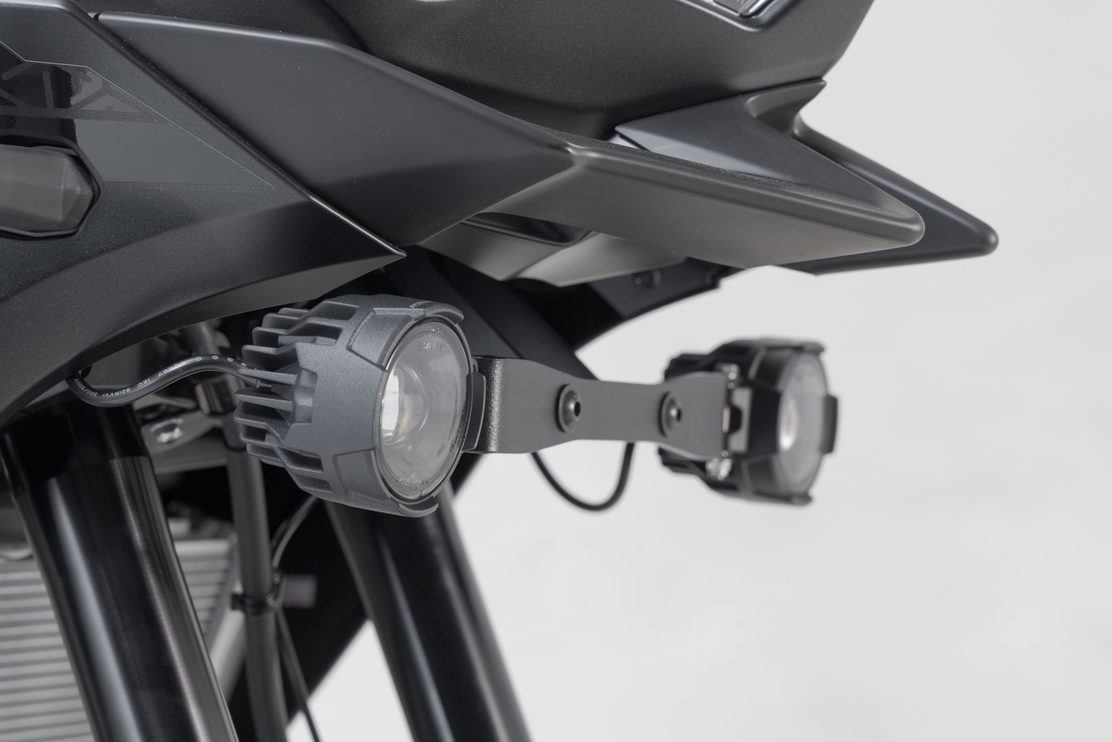 Side view of SW-Motech EVO fog light kit - Black. Kawasaki Versys 650 (21-).