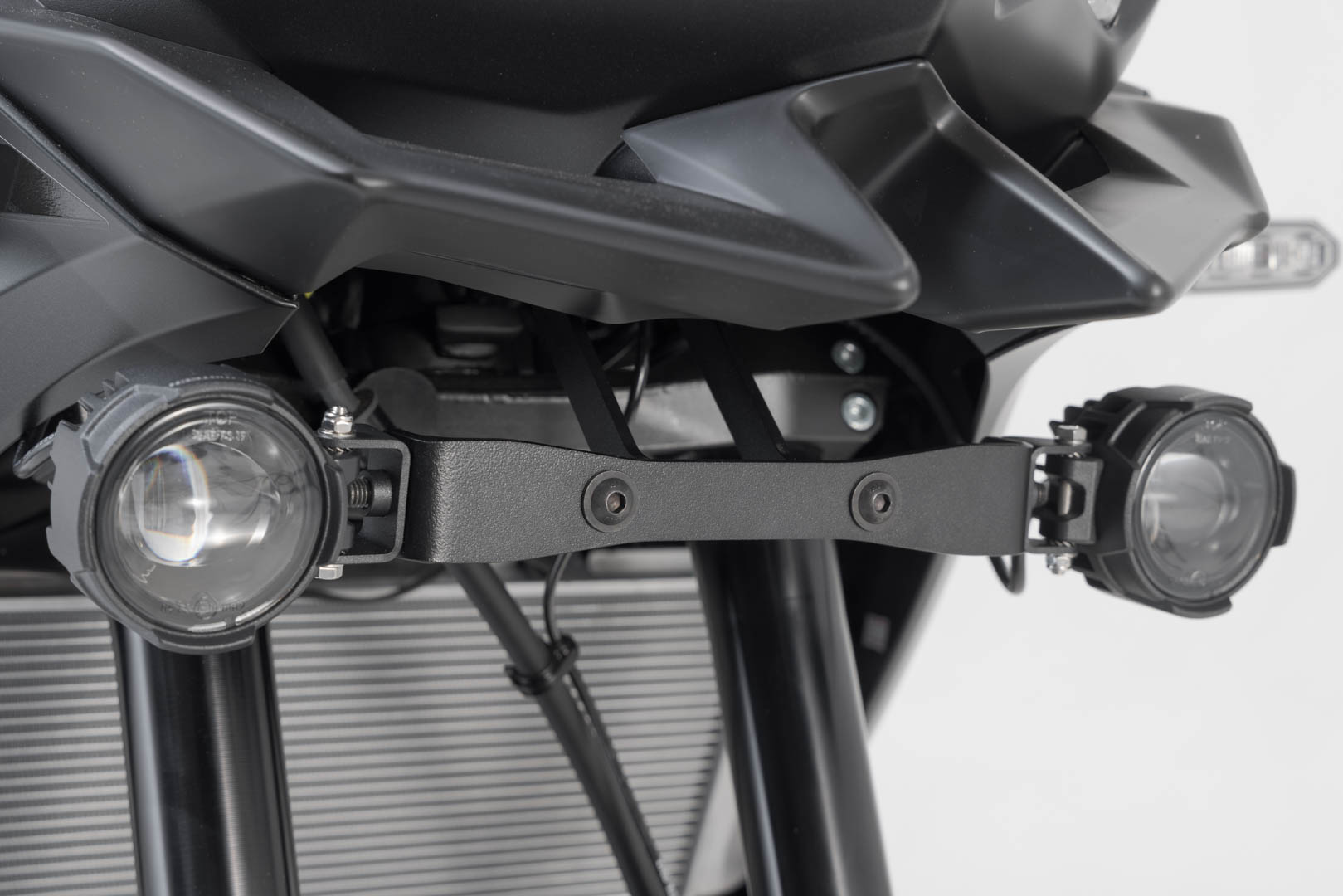 Side view of SW-Motech Light mounts - Black. Kawasaki Versys 650 (21-).
