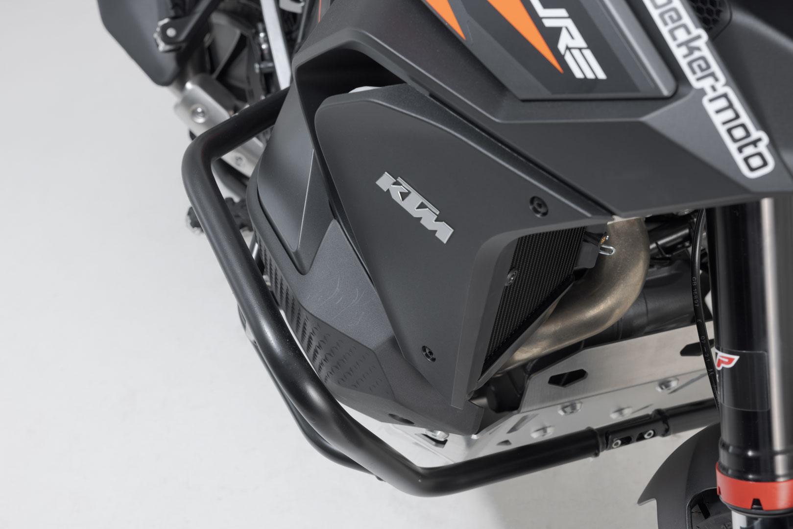 Side view of SW-Motech Crash bar - Orange. KTM 1290 / 1390 Super Adventure (21-).