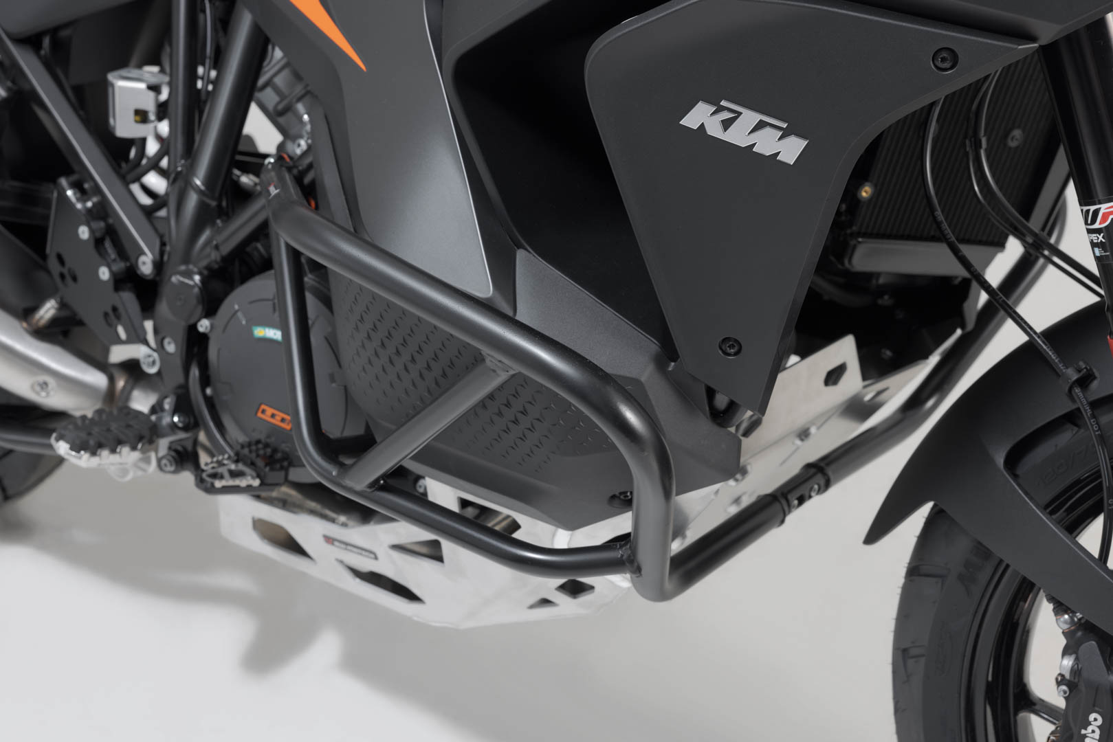 Side view of SW-Motech Crash bar - Orange. KTM 1290 / 1390 Super Adventure (21-).