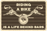 Oxford Riding a Bike メタルサイン