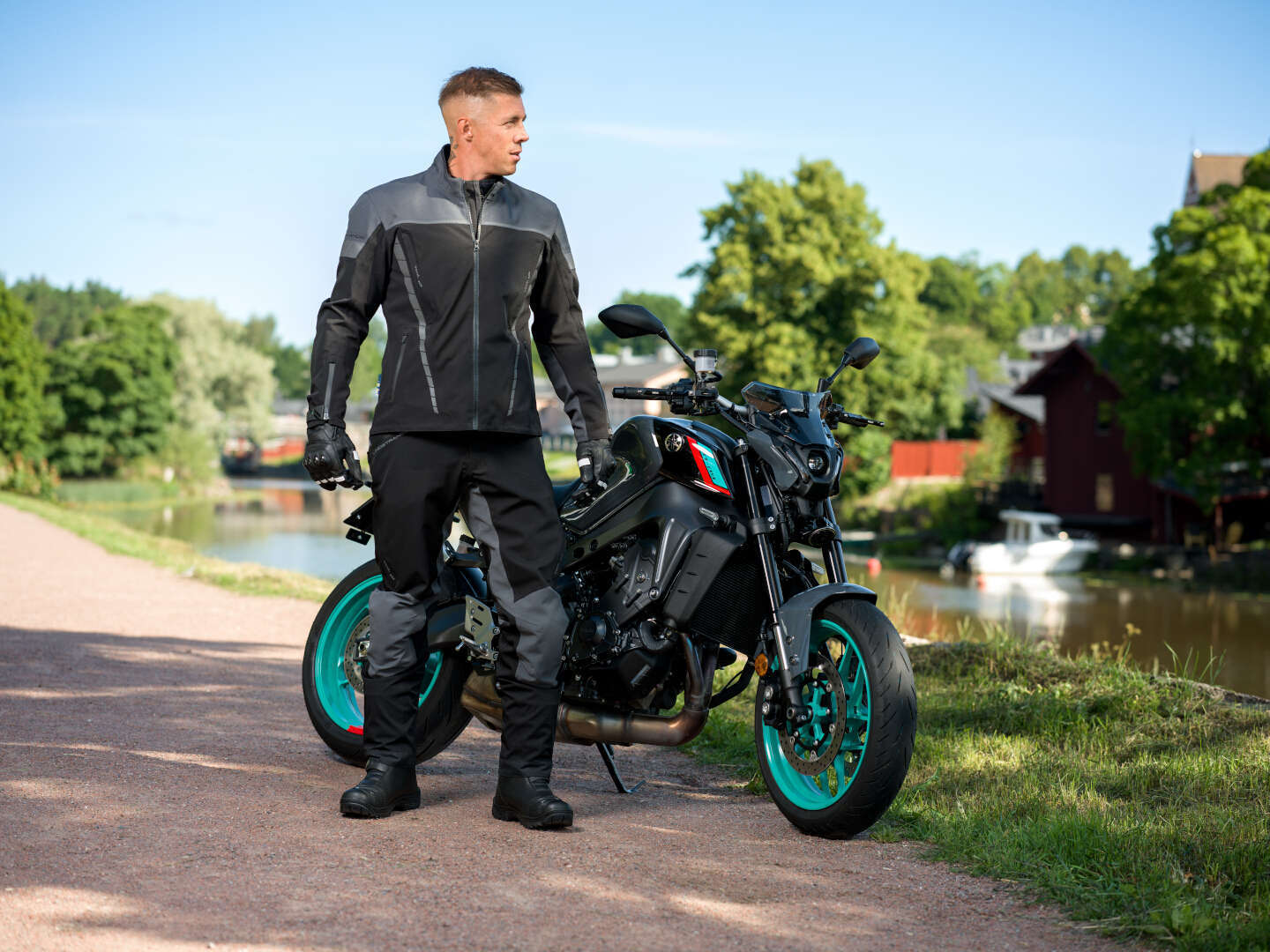 Side view of Lindstrands Bydalen waterproof Motorcycle Textile Jacket, black-grey, Size 56 for Men