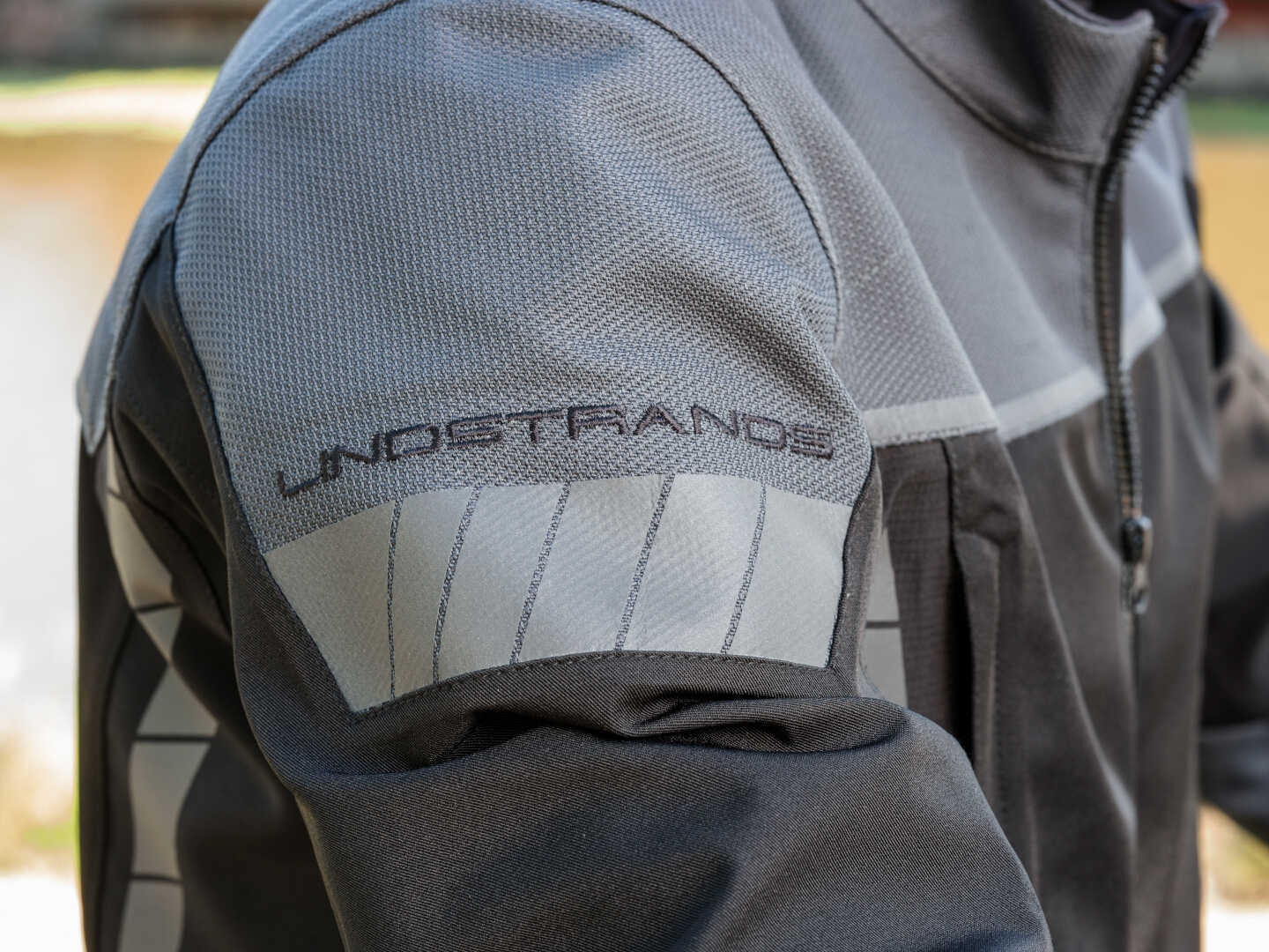 Side view of Lindstrands Bydalen waterproof Motorcycle Textile Jacket, black-grey, Size 56 for Men