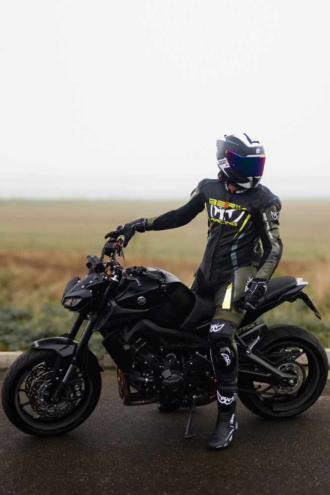 Side view of Berik Absolute GP One Piece Motorcycle Leather Suit, black-green-yellow, Size 56 for Men