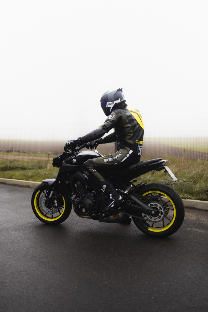 Side view of Berik Absolute GP One Piece Motorcycle Leather Suit, black-green-yellow, Size 56 for Men