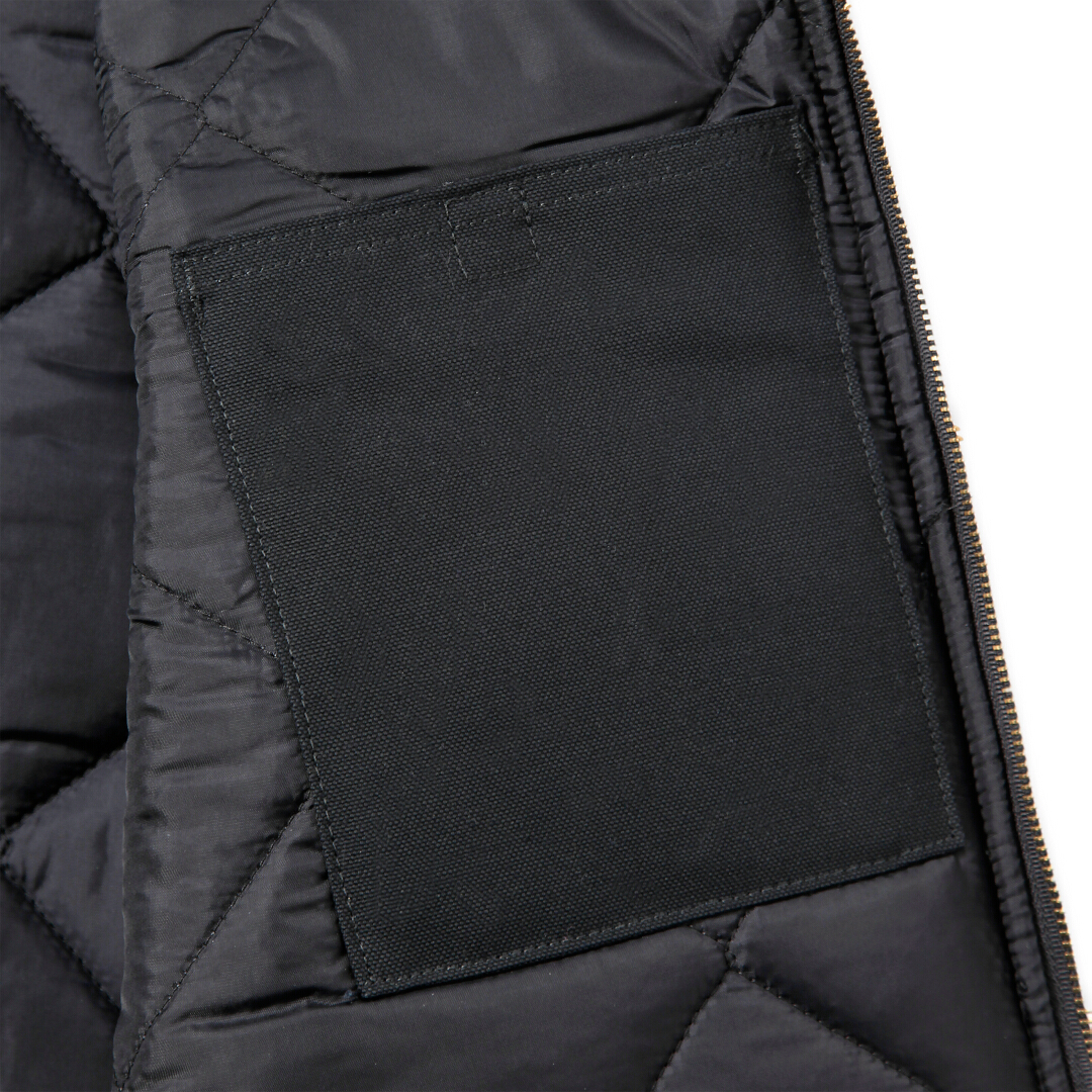 Side view of Carhartt Relaxed Fit Firm Duck Insulated Rib Collar Vest, black, Size 3XL for Men