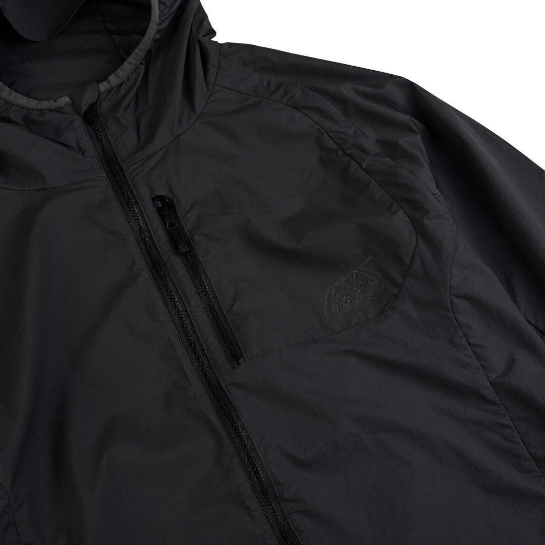 Side view of Troy Lee Designs Drift Windbreaker Mono Bicycle Jacket, black, Size XL for Men