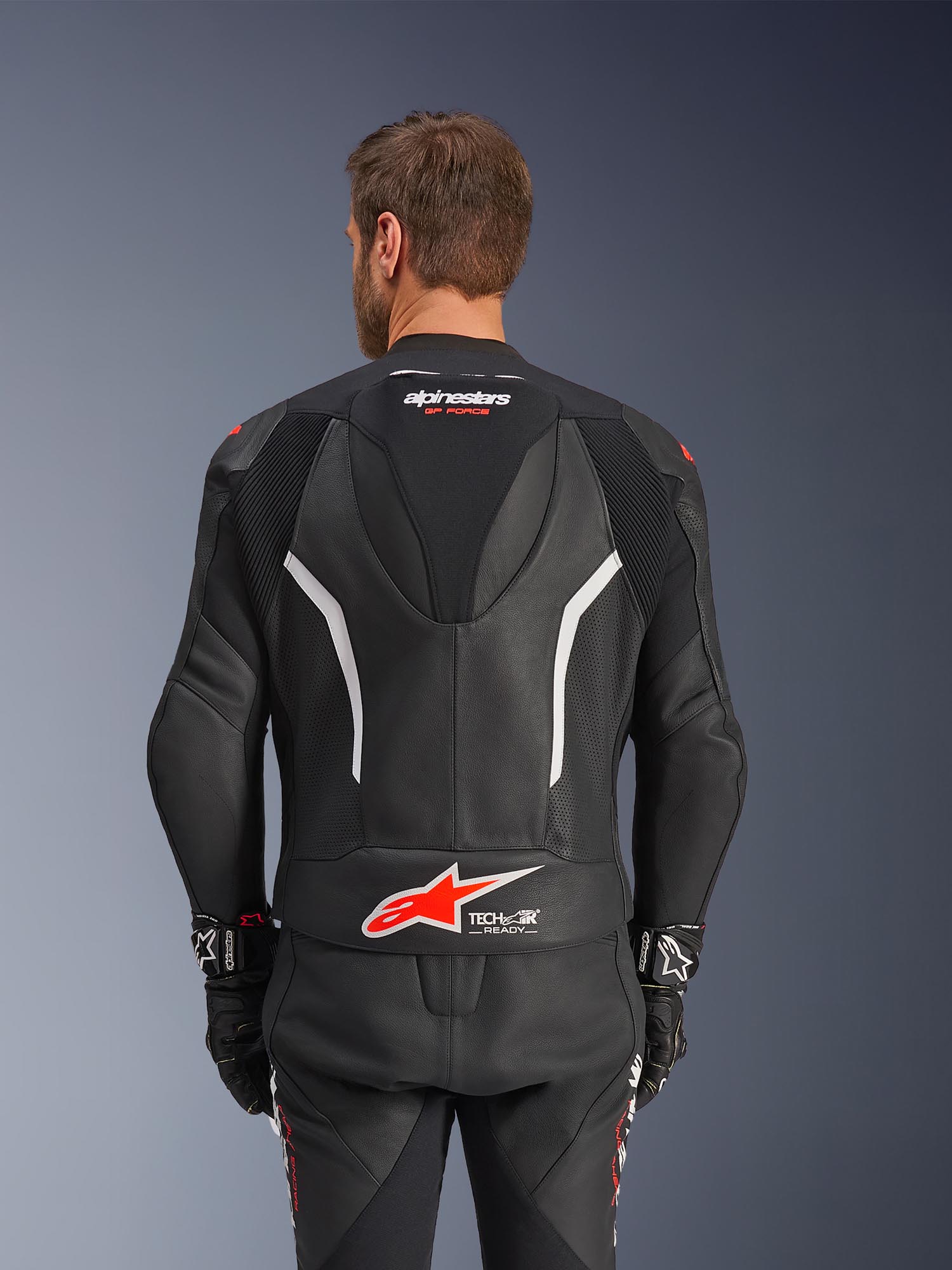 Side view of Alpinestars GP Force V2 Two Piece Motorcycle Leather Suit, black-white-red, Size 48 for Men