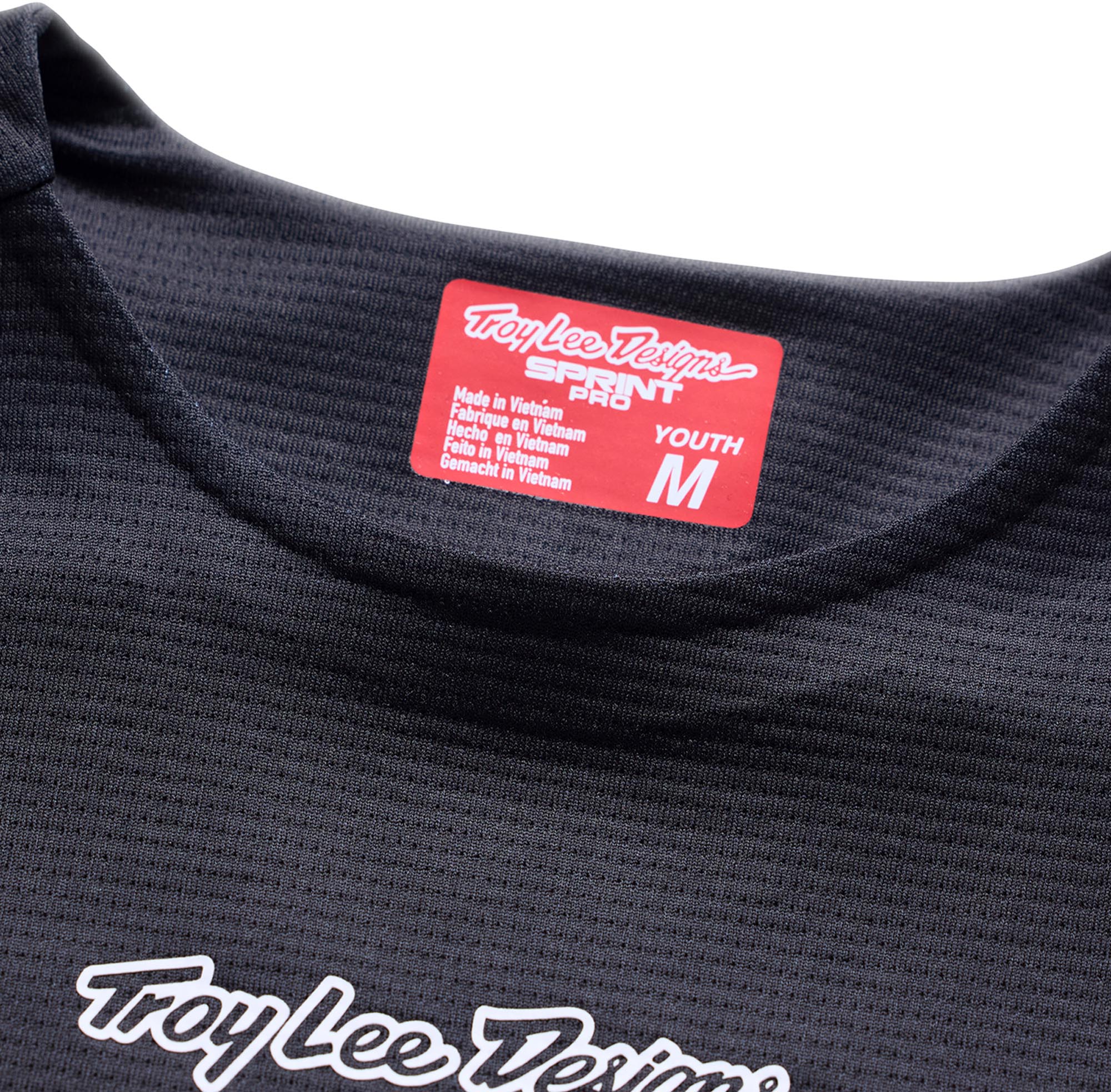 Side view of Troy Lee Designs Sprint Pro Mono Youth Bicycle Jersey, black, Size S