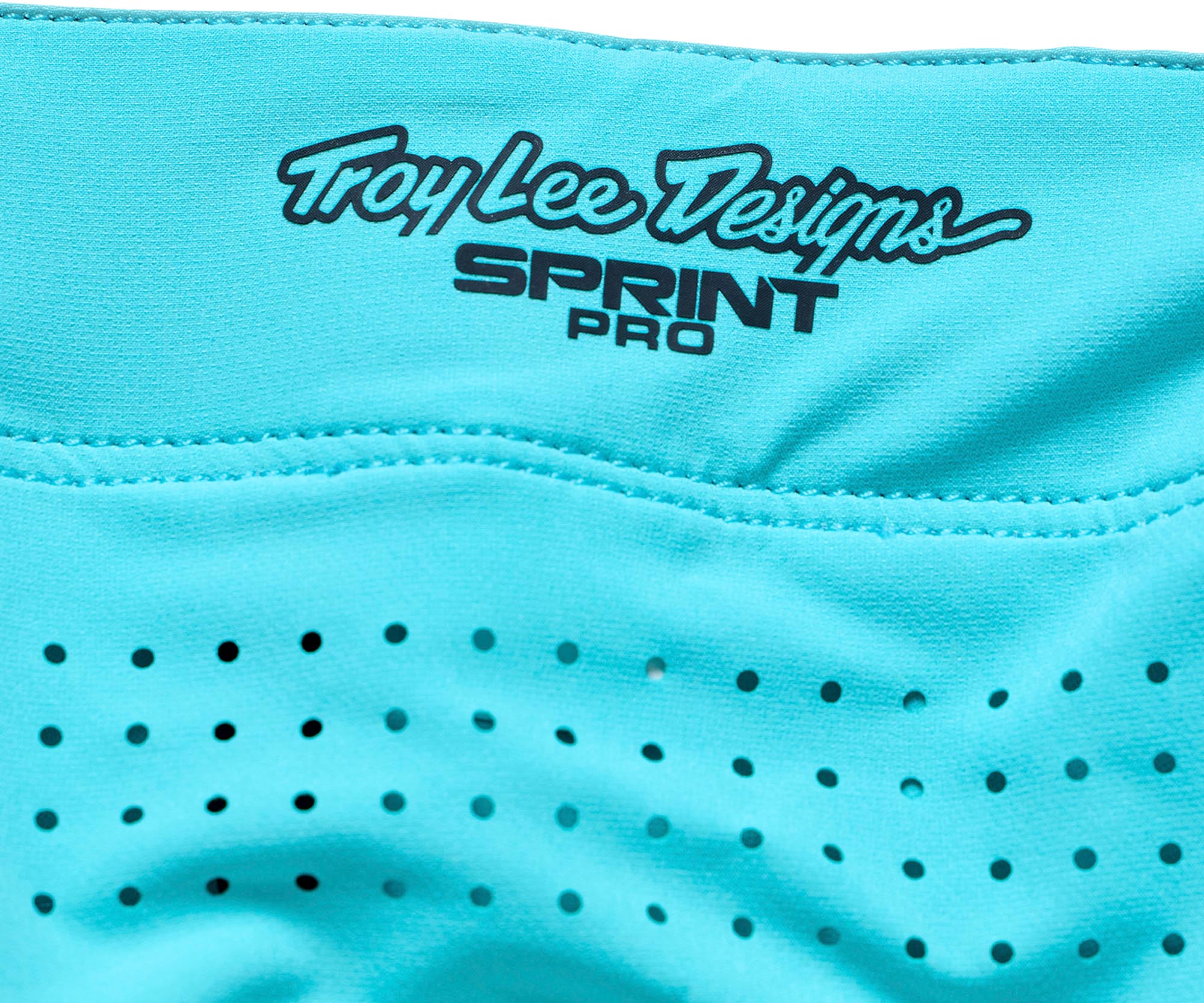 Side view of Troy Lee Designs Sprint Pro Mono Bicycle Pants, turquoise, Size 30 for Men