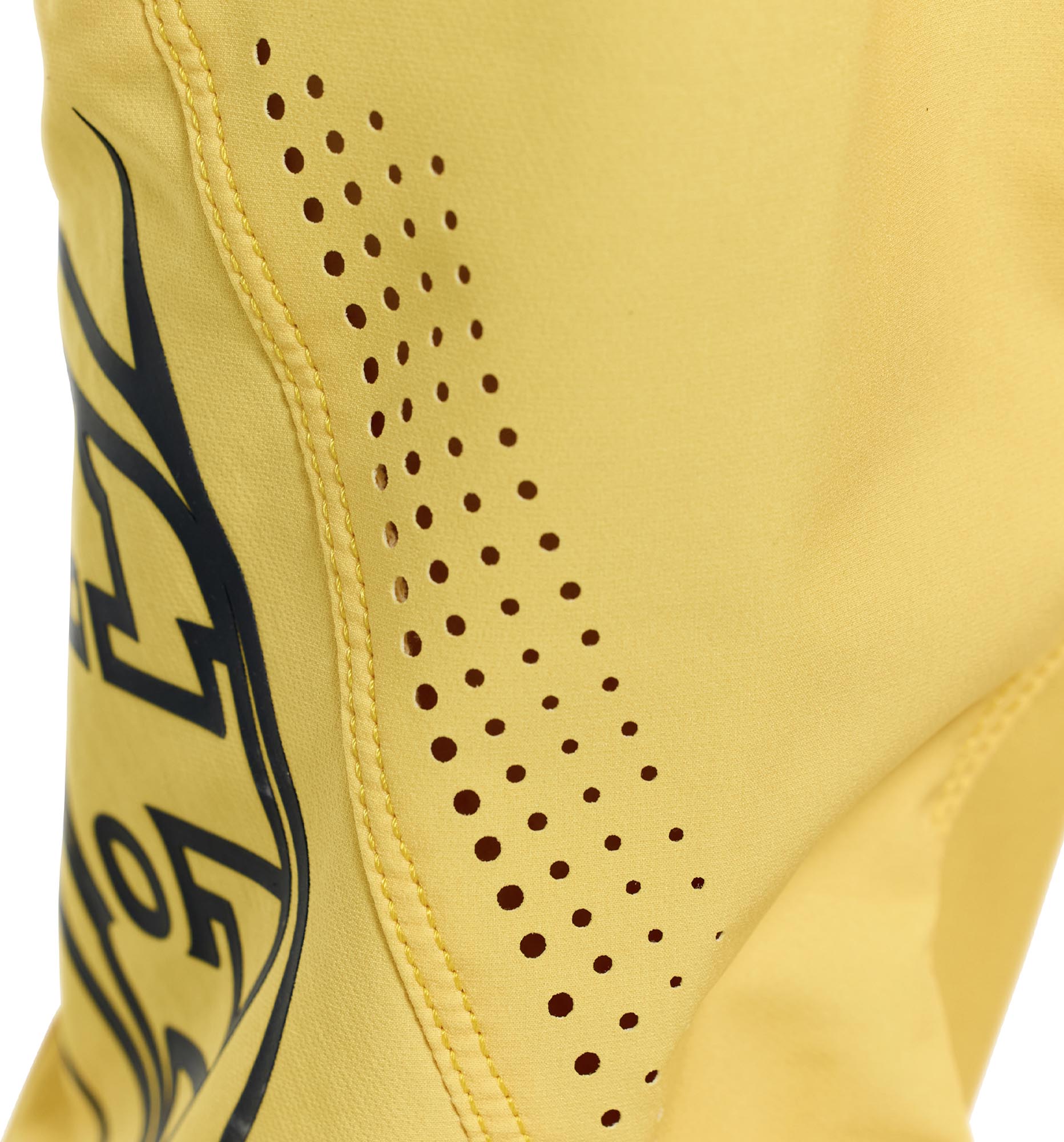 Side view of Troy Lee Designs Sprint Pro Mono Youth Bicycle Pants, yellow, Size 26