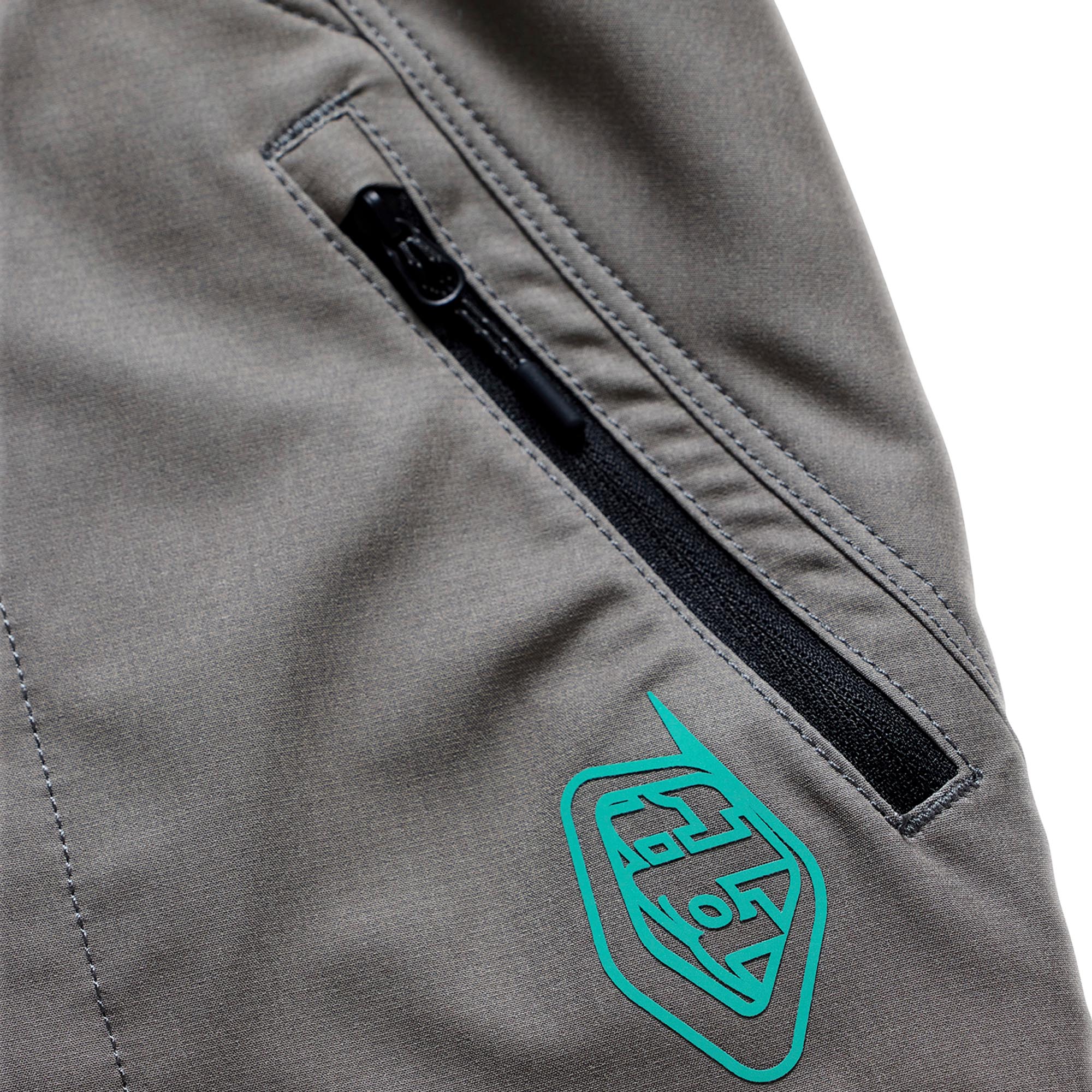 Side view of Troy Lee Designs Skyline Pro Shell Mono Bicycle Shorts, green, Size 34 for Men